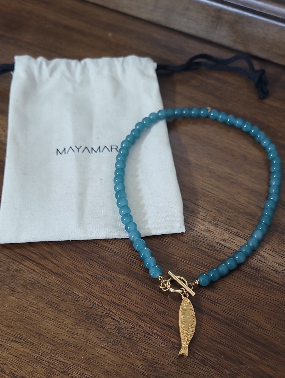 Mayamar Teal Bead Necklace with Gold Fish Charm